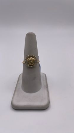 14k gold medusa head ring with CZ around it