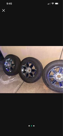 Set of 4 gmc rims and tires