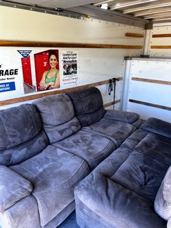 Grey reclining love seat