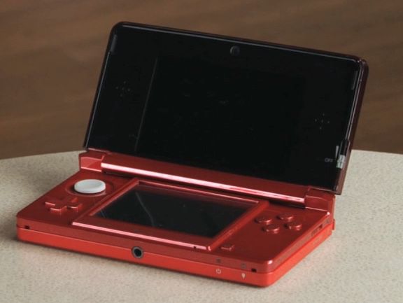 Red Nintendo 3ds with Pokemon Ultra sun