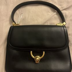 Vintage Gucci Black leather Handbag with Gold Accents