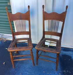 Two vintage oak chairs