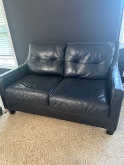 Leather love seat