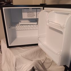 Kenmore mini refrigerator.
