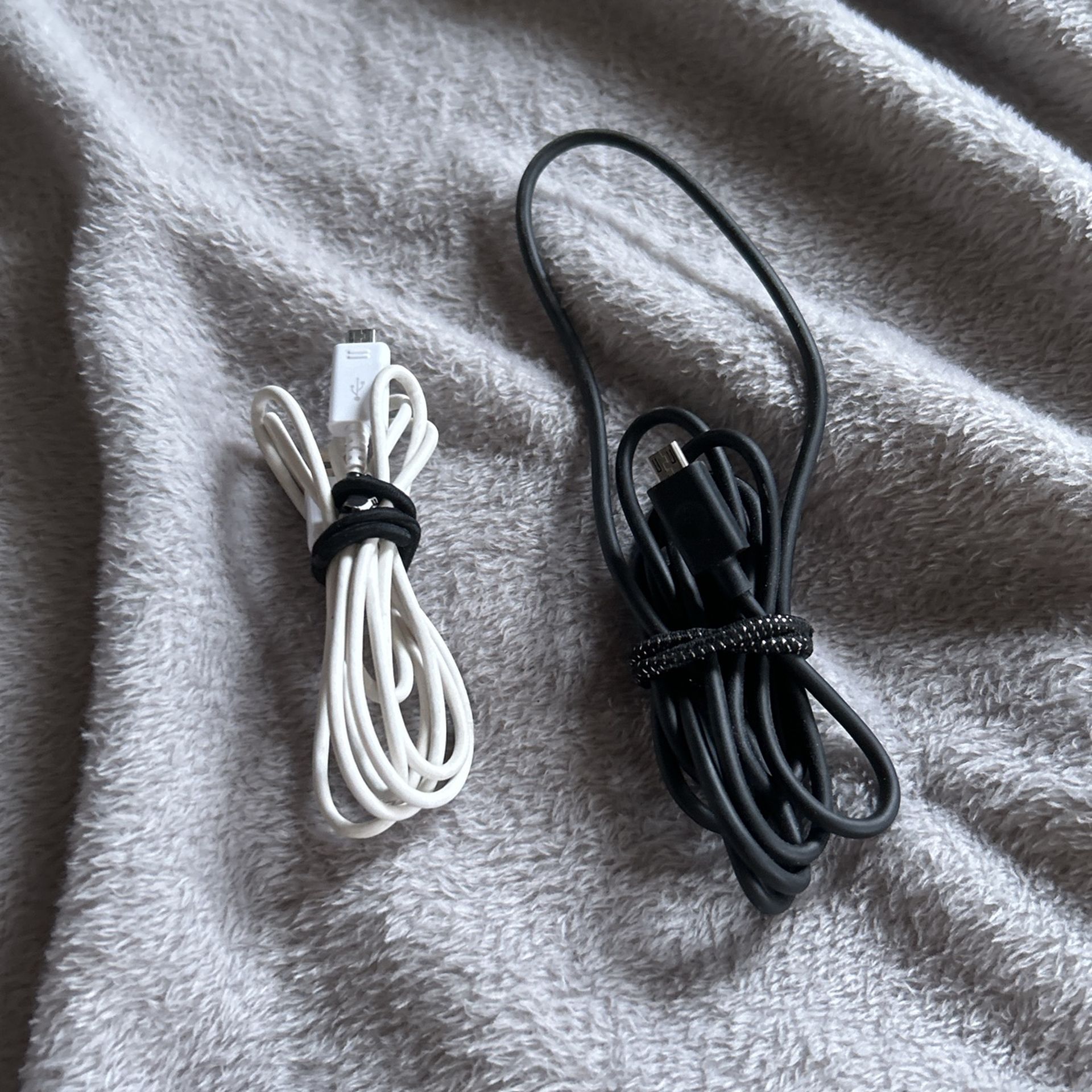 Two Cables For Charging A Phone