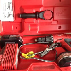Milwaukee Hammer drill  with charger