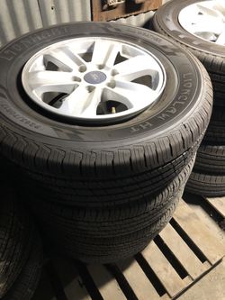 4 Ford F-150 original wheels and tires 18”