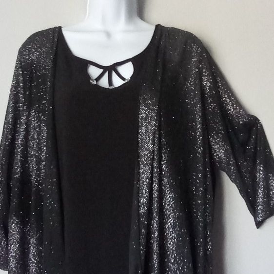 Black blouse with Glitter ,veil fabric on sleeves in size xL/1xL