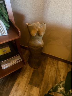 Half naked female figure statue
