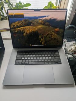 16" MacBook Pro, Apple M2 Max chip, 12 cores, 64 GB RAM, 1 TB storage.