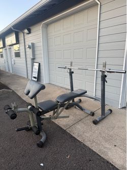 Squat Rack, Bench & Barbell + add weights for $1/lb.