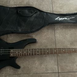 Lyon by Washburn 4 String Electric Bass Guitar in Black with case and stand. As is. See photos. Great overall condition