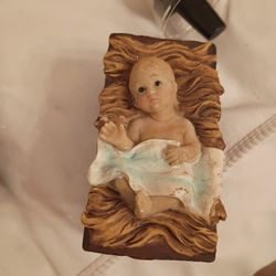 Baby Jesus laying in a manger I don't know what it's worth I can't find it nowhere on the Internet firm price$ 10 bucks pick up only 865 Ellsworth ave
