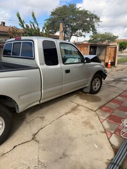 2002 Toyota pick up front damage new tires , new battery