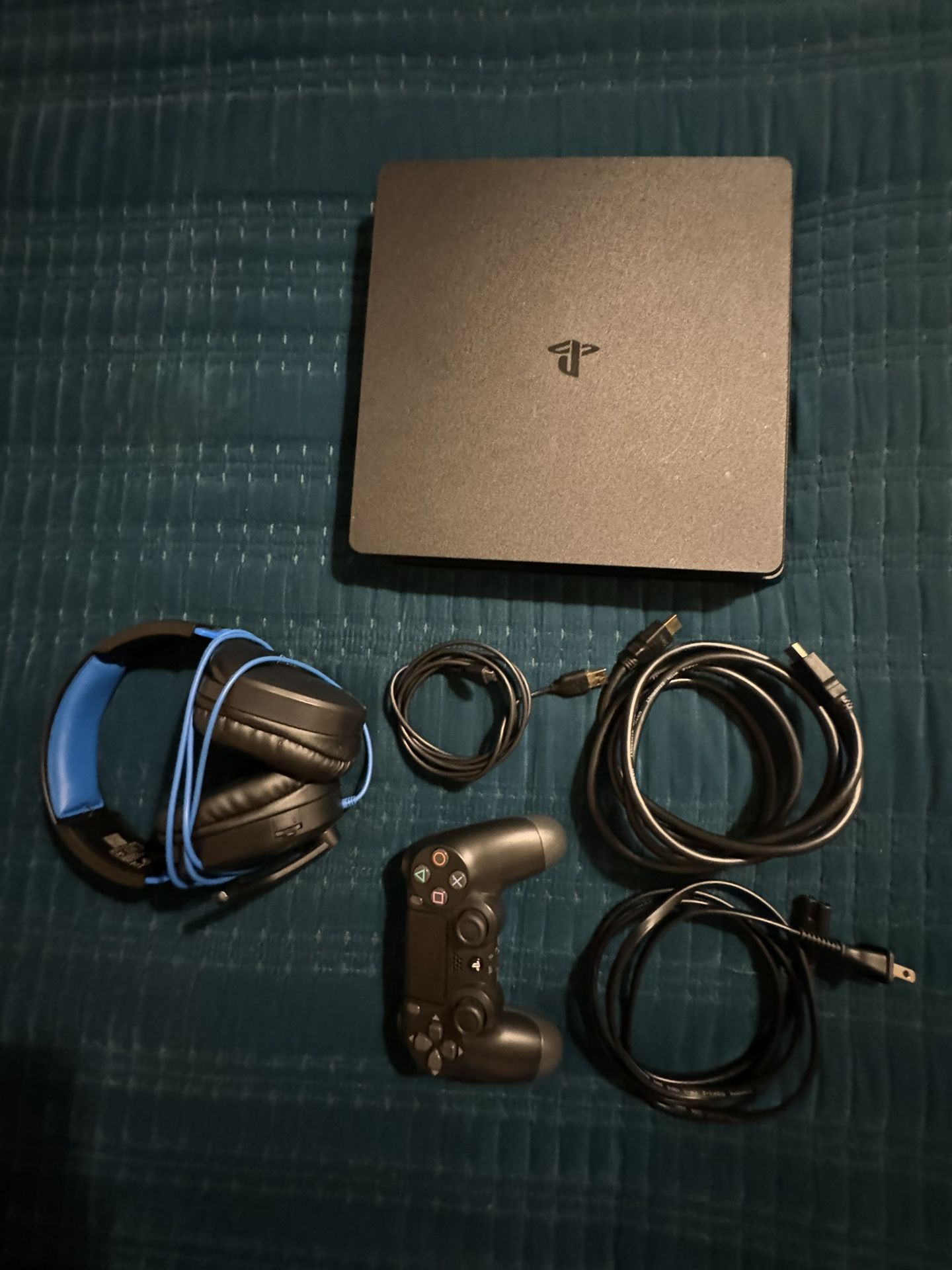 PS4 Slim 500gb. Comes with controller, and Turtle beach headset.