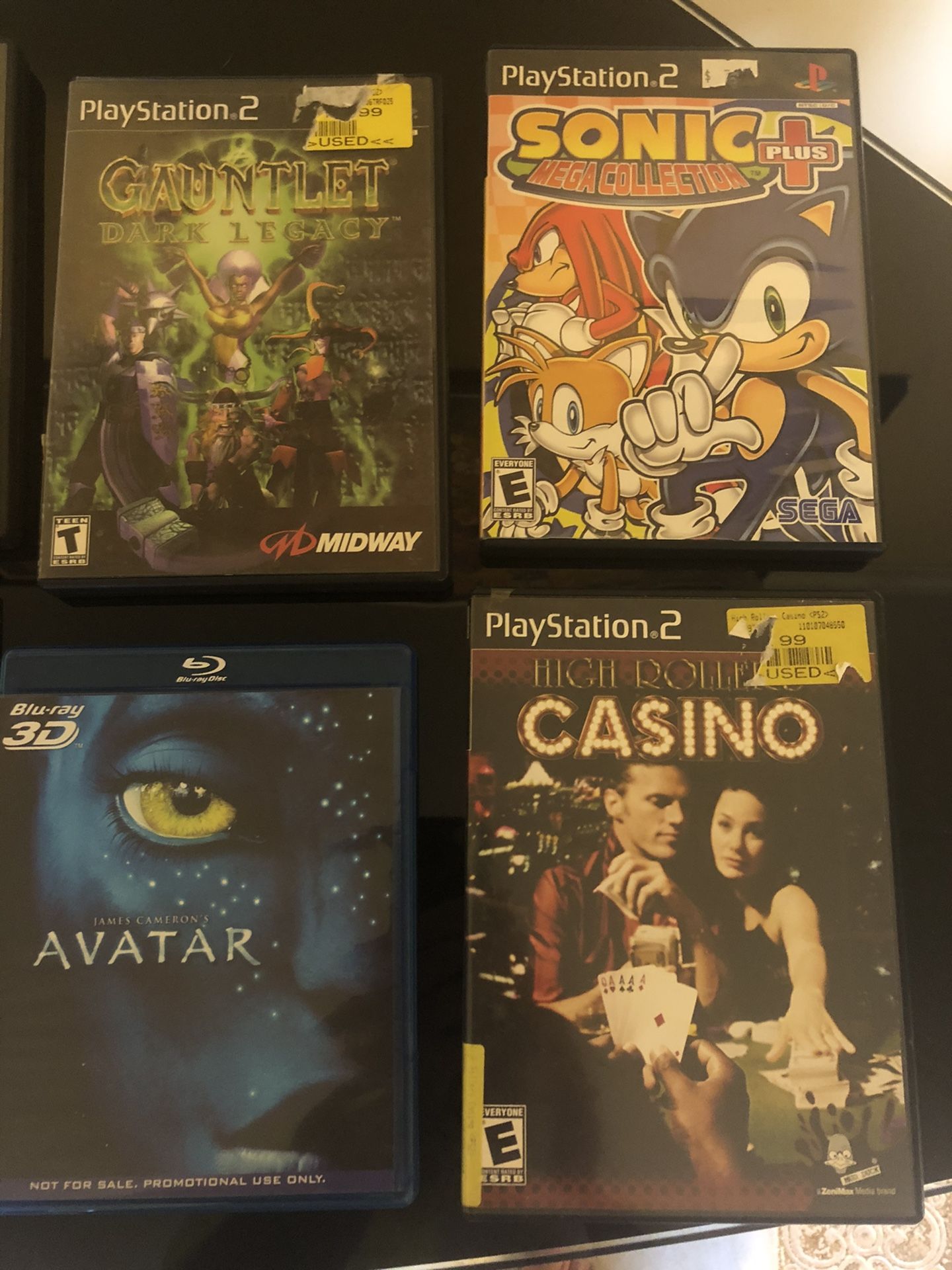 PlayStation 2 games and movie DVDs