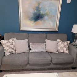 Ashley's Gray Nailhead Trim Sofa With Pillows 