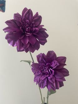 2 purple faux flowers