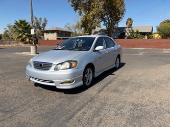 Toyota Corolla Silver 4-Door Sedan