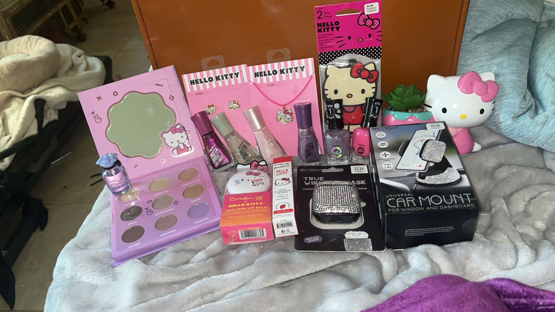 Brand New Hello Kitty items, AirPods case, car nail polishes