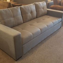 Brand new gray pull out sofa futon