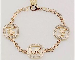 Gold plated Mk bracelet new