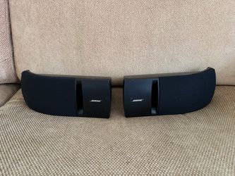 The Bose 161 Speaker System is a pair of versatile, passive bookshelf and wall-mountable speakers originally priced around $80–$100. They feature dual