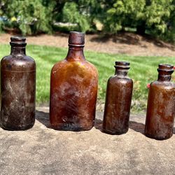 Seven Antique Brown Apothecary Bottles 