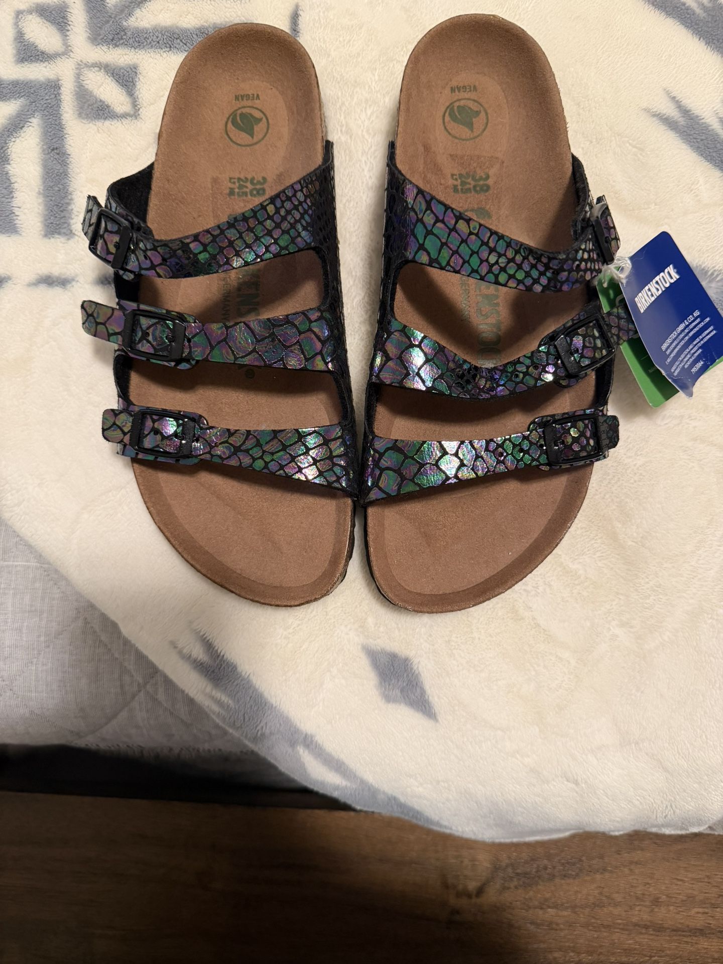 Birkenstock Florida Fresh Vegan sandals in a shiny snake skin print.