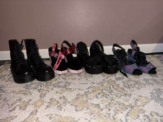 Four Pairs Of Shoes