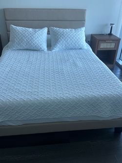 Sand colored Queen Sized Bed Frame - <1 yr old, excellent condition