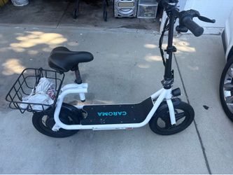 Caroma e scooter with seat