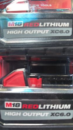 2 Milwaukee M18  6 amph batteries