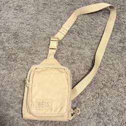 The Sport Sling in Beige Crossbody Bag Women’s 