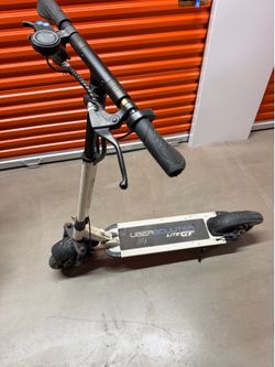 Electric scooter.  Uber Scuuter (25mph) 25 mile charge