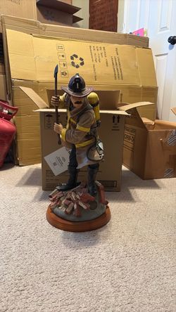 Fireman statue almost 2ft tall (Heavy) numbered.