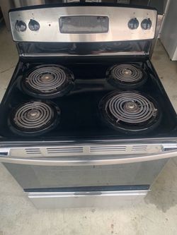 GE coil top stainless steel stove