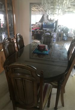 Dining room table with six chairs and China cabinet