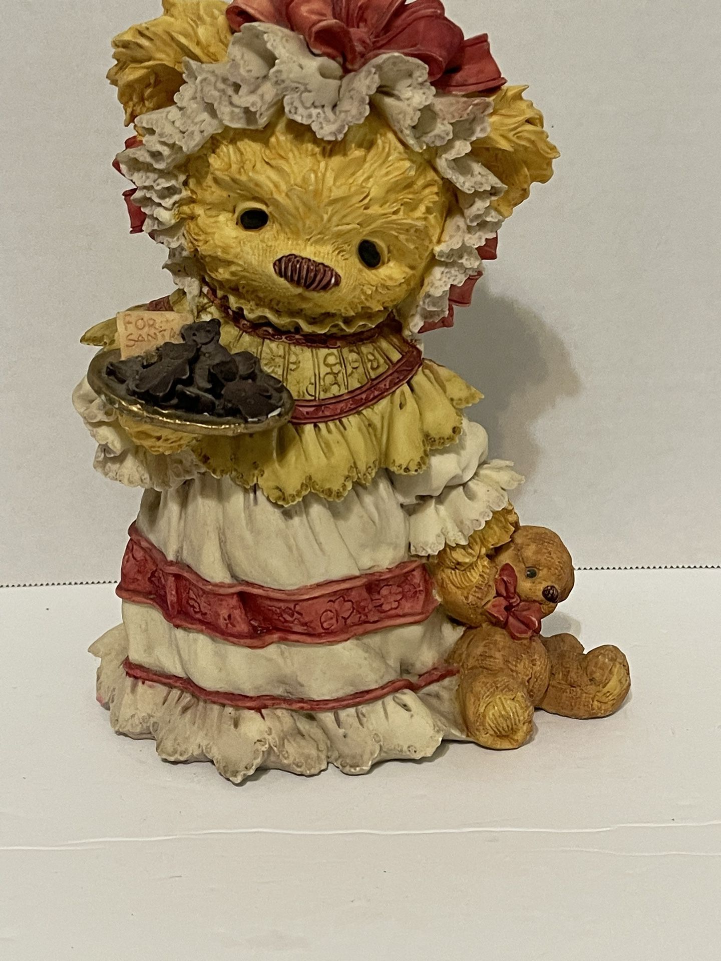 Small resin teddy bear figurine.  