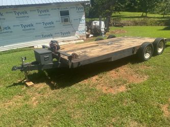 7x16 trailer it has a 12,000 pound winch on it price is 3000  no holds