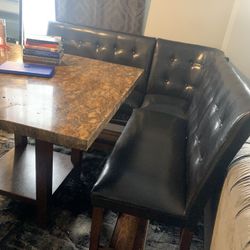 Dining room table with sectional benches and two single chairs $400