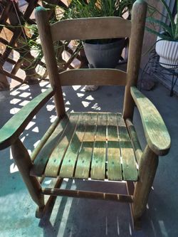 Vintage wooden child rocking chair