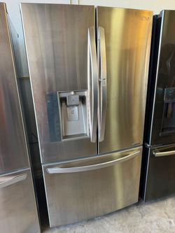 Refrigerator available in excellent condition with warranty; delivery available for an extra charge.