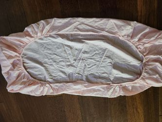 Light pink bassinet sheet