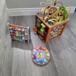 Zany Zoo Wooden Activity Cube, J'Adore Wooden Clock Shape Sorter And J'Adore Alphabet Mathematics. 