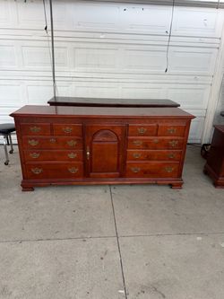 Cherry Wood Triple Dresser with Brass Hardware