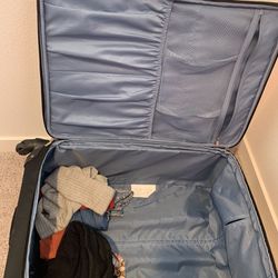 New Suitcase Full Of Clothes 