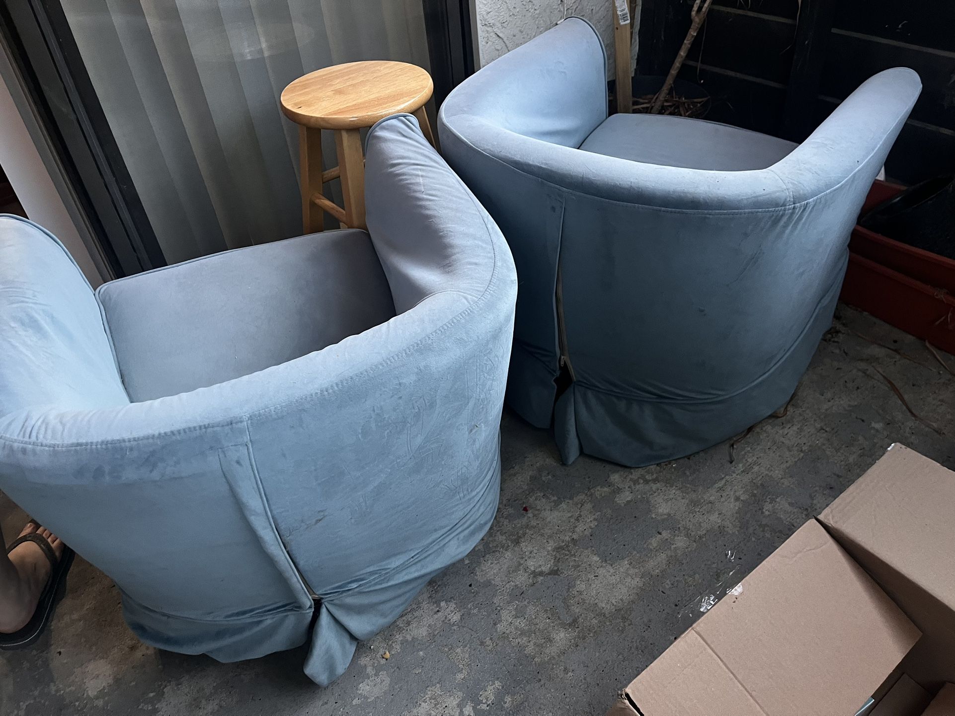 barrel chair, light blue velvet fabric.