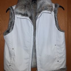 Womens size XL,  Faux Leather And Fur Reversible Vest 
