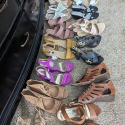 Bags Full Of Woman's Shoes And Clothing 
